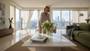 Designer arranging flowers in marble luxury living room