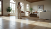 Designer in luxury living room with travertine tile