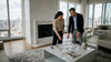 Couple viewing marble accent samples in penthouse