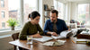 Couple reviewing marble tabletop sample at home