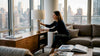 Designer adjusting marble lamp in living room
