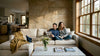 Couple relaxing in stone-accented living room