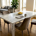 Elegant marble dining table in bright apartment