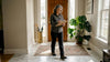 Person inspecting marble floor for longevity