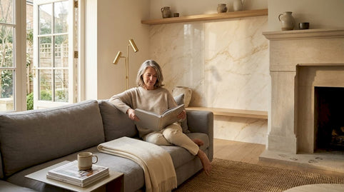 Homeowner relaxing in stone-accented living room