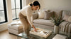 Person arranging luxury stone home accessories