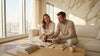Couple reviewing stone finishes in luxury living room