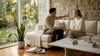 Couple discussing stone textured accent wall