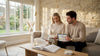 Couple reviewing stone decor samples at home